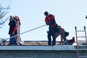 Shane David Roofing crew working on a roof replacement in Northern Michigan